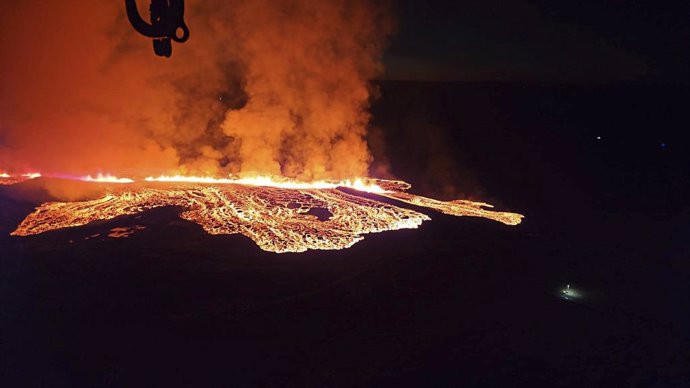 January 14, 2024, Grindavik, Iceland: Lava spews from a vent as Fagradalsfjall volcano moved toward a small coastal fishing village on the Reykjanes peninsula of south-west Iceland, January 14, 2024 near Grindavik, Iceland. A second vent opened surprising