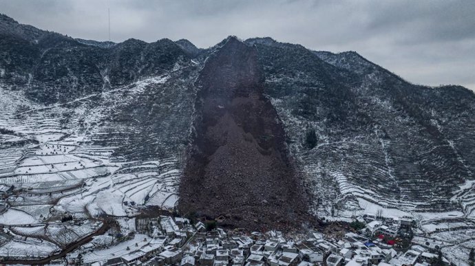 KUNMING, Jan. 22, 2024  -- An aerial drone photo taken on Jan. 22, 2024 shows the site of a landslide in Liangshui Village, Tangfang Town in the city of Zhaotong, southwest China's Yunnan Province.   China's Ministry of Emergency Management has upgraded