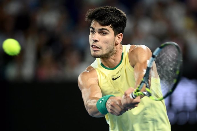 Carlos Alcaraz of Spain in action during his Mens Quarterfinal match against Alexander Zverev of Germany on Day 11 of the 2024 Australian Open at Melbourne Park in Melbourne, Wednesday, January 24, 2024. (AAP Image/Joel Carrett) NO ARCHIVING, EDITORIAL 