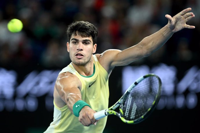 Carlos Alcaraz of Spain in action during his Mens Quarterfinal match against Alexander Zverev of Germany on Day 11 of the 2024 Australian Open at Melbourne Park in Melbourne, Wednesday, January 24, 2024. (AAP Image/Joel Carrett) NO ARCHIVING, EDITORIAL US