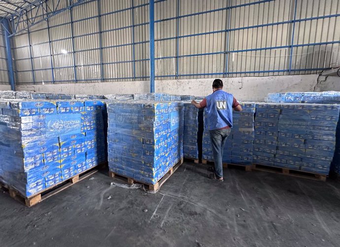 November 4, 2023, Dair El-Balah, Gaza Strip, Palestinian Territory: Workers of the United Nations Relief and Works Agency for Palestine Refugees (UNRWA) pack the medical aid and prepare it for distribution to Shelter centers at a warehouse in Deir Al-Bala