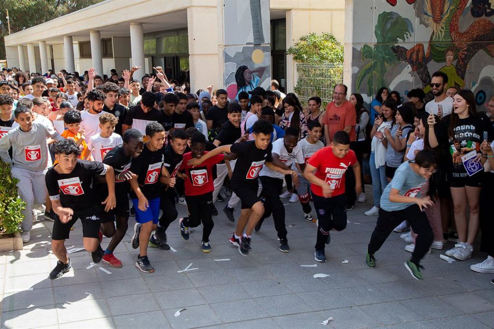 Un grupo de niños participan en la carrera de Save The Children 'Kilómetros de Solidaridad'.