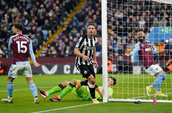 30 January 2024, United Kingdom, Birmingham: Newcastle United's Fabian Schar (C) celebrates scoring his side's second goal during the English Premier League soccer match between Aston Villa and Newcastle United at Villa Park. Photo: Jacob King/PA Wire/d