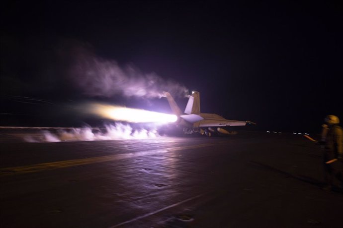 January 22, 2024, Red Sea, United States: A U.S. Navy F/A-18F Super Hornet fighter jet, performs a night-time launch off the flight deck of the Nimitz-class aircraft carrier USS Dwight D. Eisenhower in support of Operation Prosperity Guardian, January 2