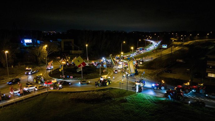 31 January 2024, Belgium, Mechelen: Tractors at a protest action by farmers. 