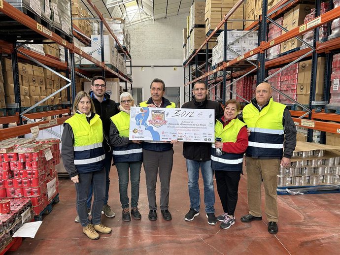 Entrega cheque FRB al Banco de Alimentos