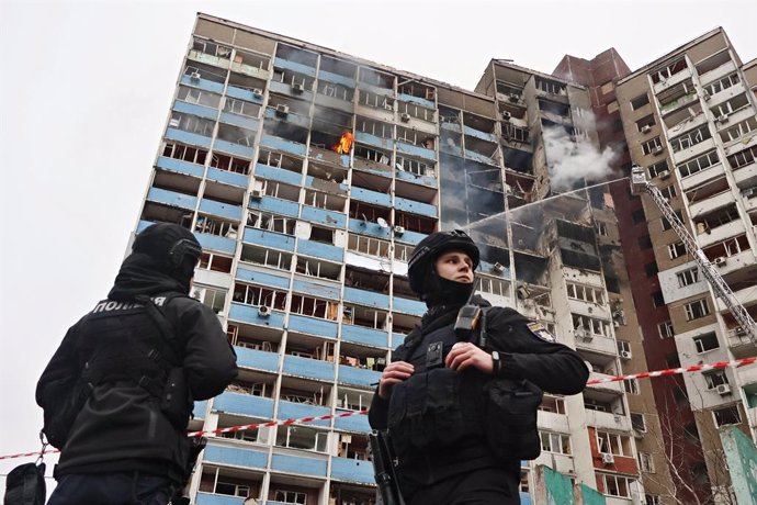 February 7, 2024, Kyiv, Ukraine: Ukrainian rescuers extinguish a fire in a residential building following a missile attack in Kyiv amid the Russian invasion of Ukraine. Russia launched a missile strike on Kyiv, Ukraine, according to the statement from loc