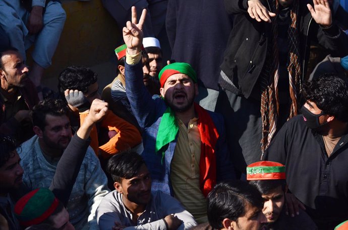 February 9, 2024, Peshawar, Peshawar, Pakistan: Tehreek-e-Insaf workers are protesting by blocking the road against the Election CommissionPESHAWAR, PAKISTAN, FEBRUARY, 09: Tehreek-e-Insaf workers are protesting by blocking the road against the Election C