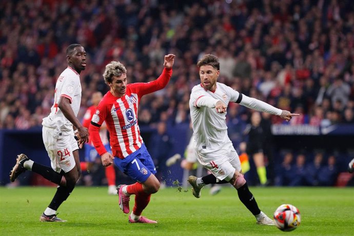 Antoine Griezmann of Atletico de Madrid and Sergio Ramos of Sevilla in action during the Spanish Cup, Copa del Rey, football match played between Atletico de Madrid and Sevilla FC at Civitas Metropolitano stadium on January 25, 2024 in Madrid, Spain.