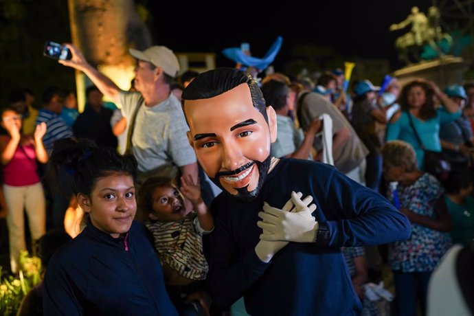 February 4, 2024, San Salvador, El Salvador: A person dressed in costume depicting Nayib Bukele gestures at his celebration after calling a victory. The Supreme Electoral Tribunal announced it would do a vote recount after anomalies during the preliminary