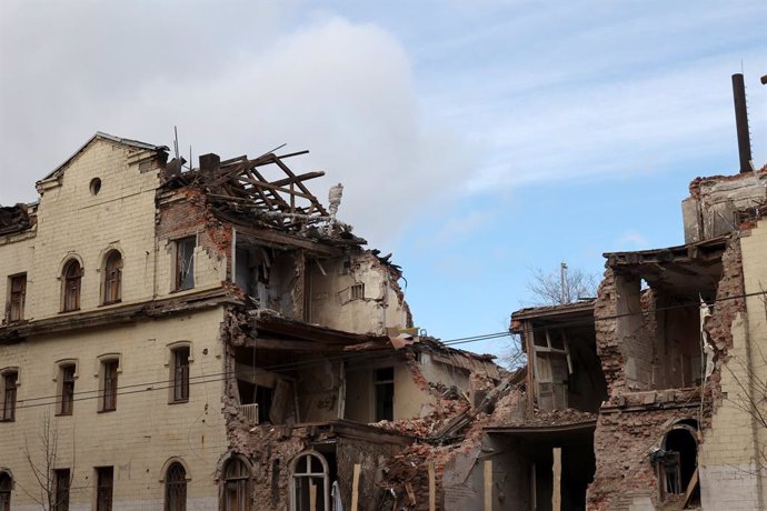 February 8, 2024, Kharkiv, Ukraine: KHARKIV, UKRAINE - FEBRUARY 08, 2024 - Repair works conducted on the roof of a building damaged by Russian shelling, Kharkiv, north-eastern Ukraine.