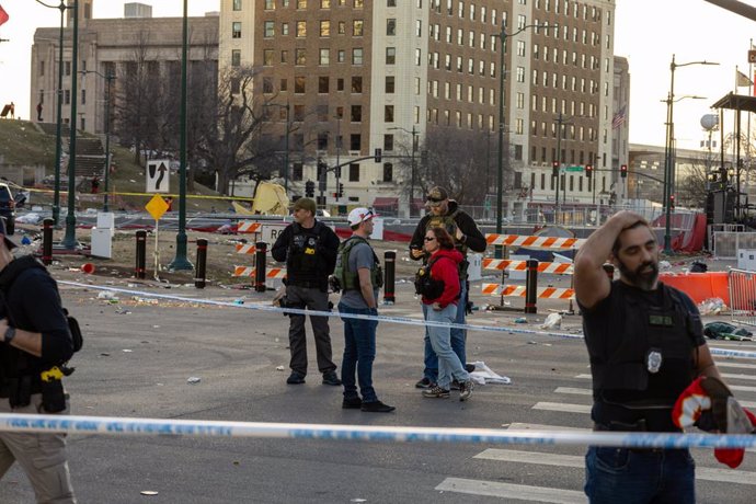 KANSAS CITY, Feb. 15, 2024  -- Policemen work at the site following a shooting in Kansas City, Missouri, the United States, Feb. 14, 2024. At least one person was killed and 22 were injured as gunfire erupted during the Kansas City Chiefs' Super Bowl vict