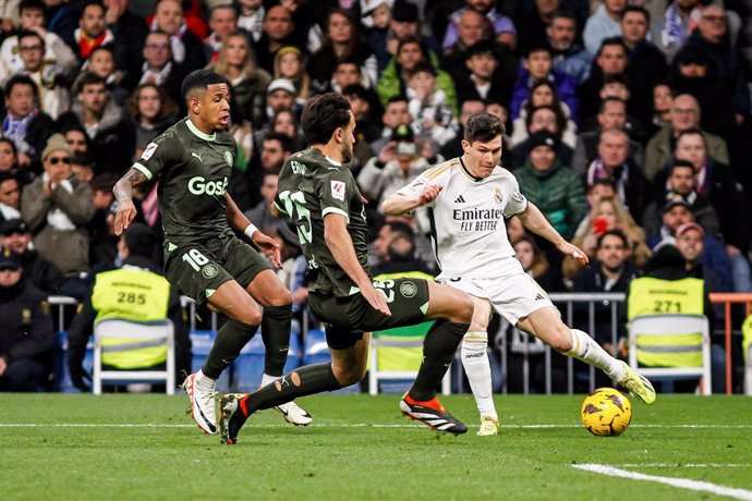 Savio Moreira and Eric Garcia of Girona FC and Fran Garcia of Real Madrid in action during the Spanish League, LaLiga EA Sports, football match played between Real Madrid and Girona CF at Santiago Bernabeu stadium on February 10, 2024 in Madrid, Spain.