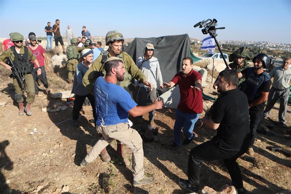 Archivo - Enfrentamiento entre colonos israelíes y palestinos en Hebrón