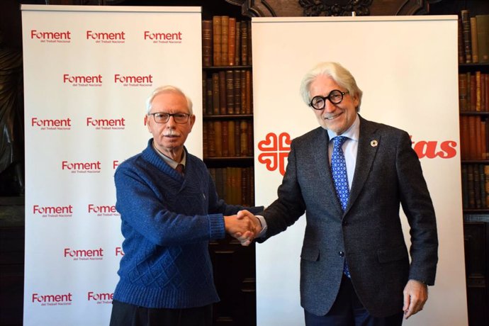 Roig i Sánchez Llibre en la signatura del pacte de col·laboració