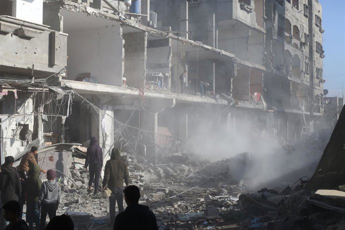 GAZA, Feb. 22, 2024  -- People conduct rescue work after an Israeli airstrike in the southern Gaza Strip city of Rafah, on Feb. 22, 2024. The Palestinian death toll from the ongoing Israeli attacks on Gaza has risen to 29,410, with 69,465 others wounded