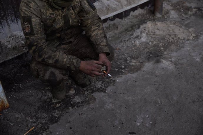 February 17, 2024, Avdiivka, Donetsk Oblast, Ukraine: Maxim, a Ukrainian soldier, sits down following his escape from the city of Avdiivka. As the Ukrainian army retreats from Avdiivka, reports of heavy losses continue and Russian forces advance quickly.