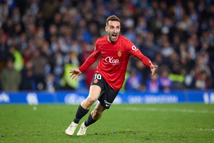 Sergi Darder of RCD Mallorca reacts after scores the winer penalty during the Copa del Rey match between Real Sociedad and RCD Mallorca at Reale Arena on February 28, 2024, in San Sebastian, Spain.