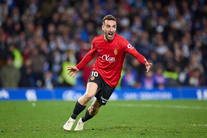 Sergi Darder of RCD Mallorca reacts after scores the winer penalty during the Copa del Rey match between Real Sociedad and RCD Mallorca at Reale Arena on February 28, 2024, in San Sebastian, Spain.