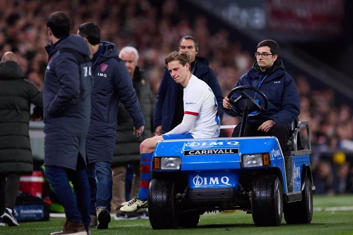 Frenkie de Jong of FC Barcelona gets injured during the LaLiga EA Sports match between Athletic Club and FC Barcelona at San Mames on March 3, 2024, in Bilbao, Spain.