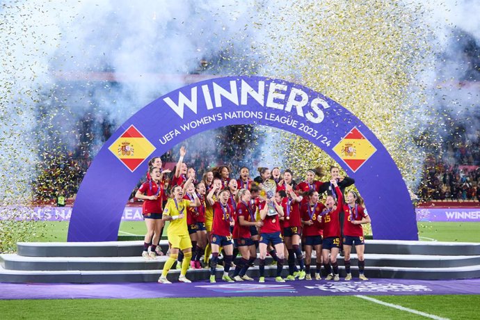 Players of Spain celebrates with the champions trophy after winning the Final UEFA Womens Nations League match played between Spain and France at La Cartuja stadium on February 28, 2024, in Sevilla, Spain.