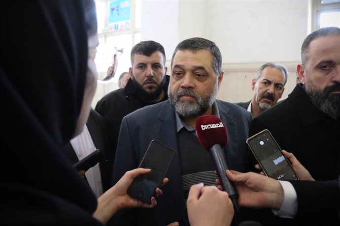 February 18, 2024, Tehran, Iran: OSAMA HAMDAN (C) Senior Hamas official speaks to the media during the 24th Iran Media Expo in Tehran. Hamdan is a former senior representative of Hamas in Lebanon and is a member of the organization's politburo. He is the 