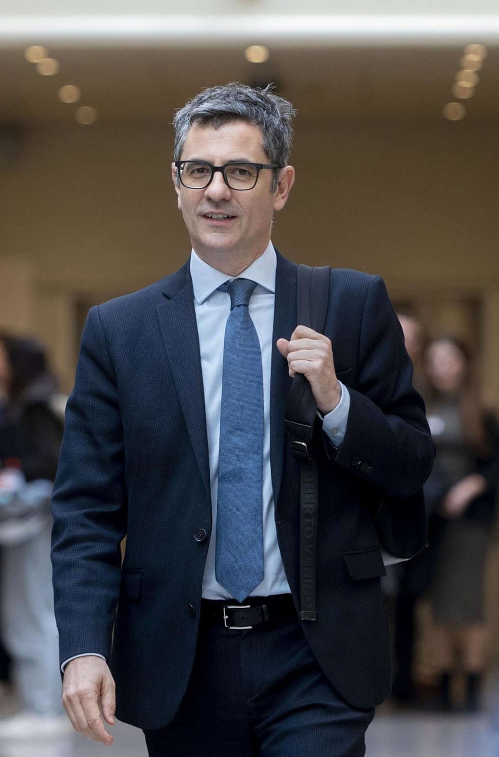 El ministro de la Presidencia, Justicia y Relaciones con las Cortes, Félix Bolaños, a su salida de una sesión de control al Gobierno, en el Senado, a 5 de marzo de 2024, en Madrid (España). 