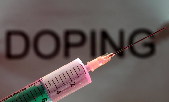 Archivo - FILED - 24 May 2007, Freiburg: A photo shows a syringe in front of the word doping. Diana Kipyokei, winner of the 2021 Boston Marathon, has been provisionally suspended for anti-doping rule violations. Photo: Patrick Seeger/dpa