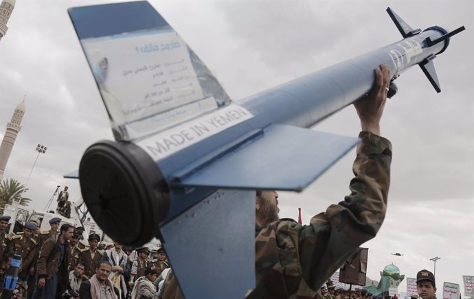 BEIJING, Feb. 18, 2024  -- A protestor holds a model of a Houthi missile during a protest against Israel's continued war on the Gaza Strip and the U.S.-led airstrikes and sanctions against the Houthi group in Sanaa, Yemen, Feb. 16, 2024.