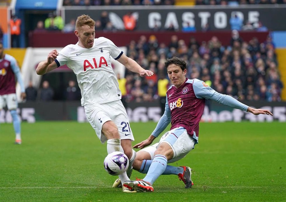 10 March 2024, United Kingdom, Birmingham: Tottenham Hotspur's Dejan Kulusevski (L) and Aston Villa's Pau Torres battle for the ball during the English Premier League soccer match between Aston Villa and Tottenham Hotspur at the Villa Park. Photo: Nick 