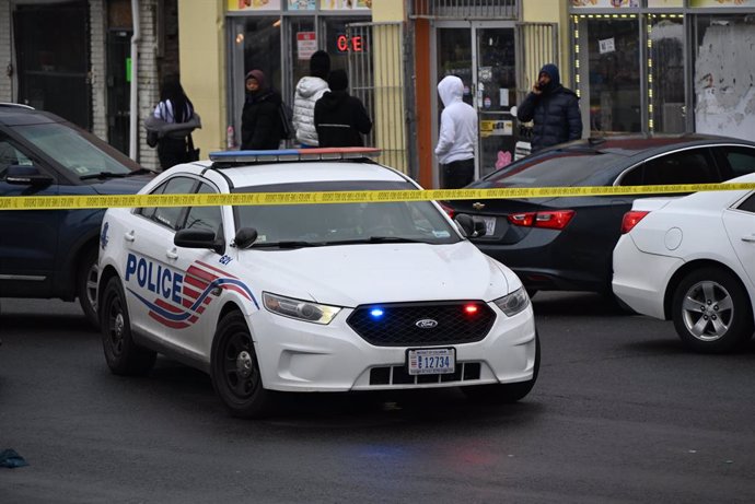 February 23, 2024, Washington, Dc, Usa: (NEW) Police officers on the scene of a shooting on the 300 Block of 63rd Street, NE that left one person injured and one person dead in Washington, DC. February 23, 2024, Washington, DC, USA: Several evidence marke