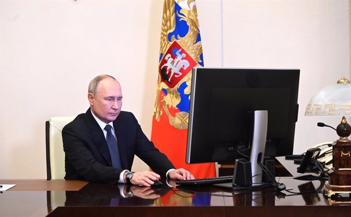 BEIJING, March 17, 2024  -- Russian President Vladimir Putin votes during Russia's presidential election on March 15, 2024.