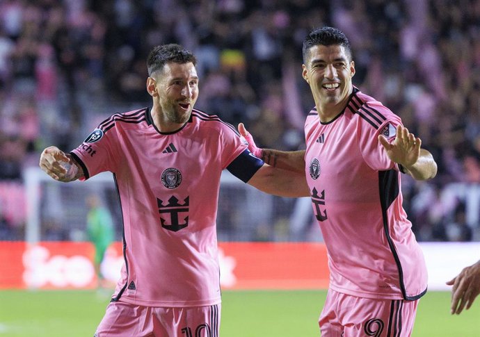 13 March 2024, US, Fort Lauderdale: Inter Miami's Lionel Messi (L) celebrates a goal with his teammat Luis Suarez during the CONCACAF Champions Cup round of 16 soccer match between Inter Miami and Nashville SC at the Chase Stadium. 