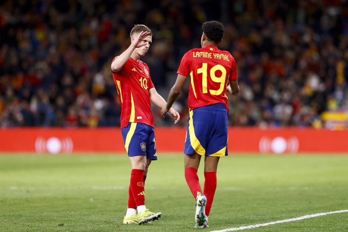 Lamine Yamal of Spain talks to Dani Olmo of Spain during the international friendly football match played between Spain and Brazil at Santiago Bernabeu stadium on March 26, 2024, in Madrid, Spain.