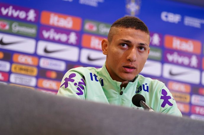 19 March 2024, United Kingdom, Shenley: Brazil's Richarlison speaks during a press conference for the Brazilian National team at Sopwell House, ahead of the international friendly soccer match against England. Photo: Jordan Pettitt/Press Association/dpa