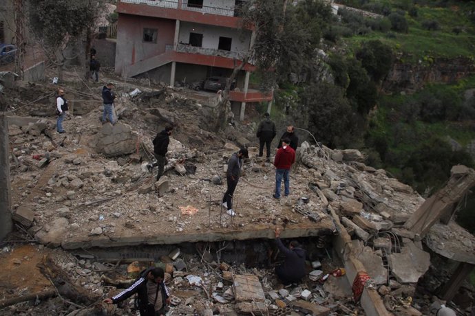 AL-HABBARIYAH, March 27, 2024  -- People inspect buildings destroyed by an Israeli strike in Al-Habbariyah, Lebanon, on March 27, 2024. At least seven were killed and more injured on Wednesday in an Israeli strike on an emergency and relief center in sout