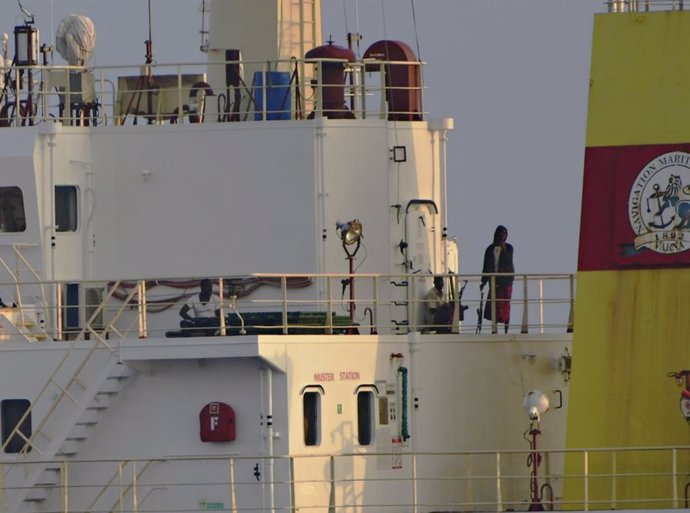 March 16, 2024, Indian Ocean, International Waters: Somali pirates holding weapons stand on the deck of the hijacked bulk carrier MV Ruen, March 16, 2024 on the Indian Ocean. The Indian navy intercepted the Maltese-flagged vessel and Marine Commando Force