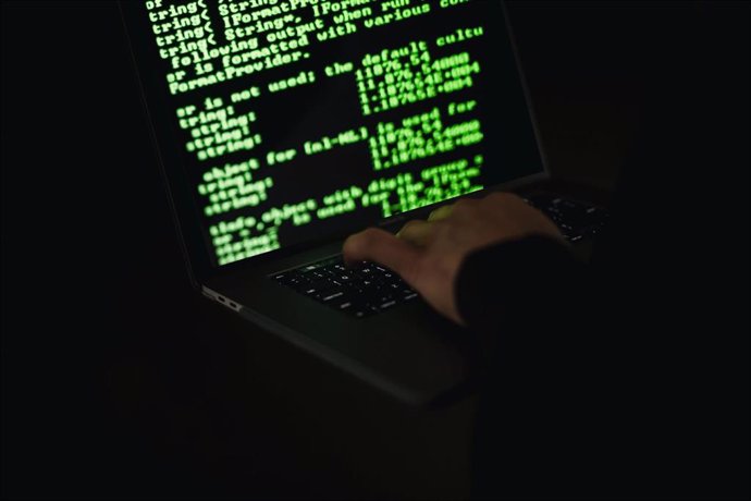 Archivo - Código en la pantalla de un ordenador.