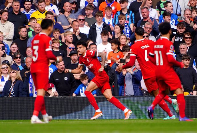 31 March 2024, United Kingdom, Liverpool: Liverpool's Luis Diaz celebrates scoring his side's first goal of the game during the English Premier League soccer match between Liverpool and Brighton at Anfield. Photo: Peter Byrne/PA Wire/dpa