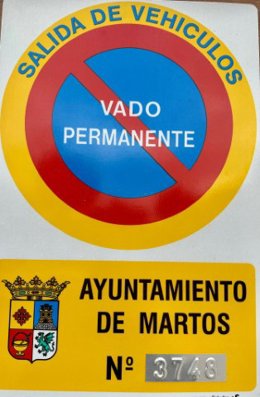 Placa de vado permanente en Martos