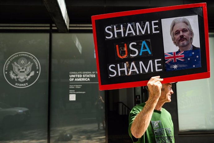 March 27, 2024, Sydney, New South Wales, Australia: A protester holds a placard with inscriptions 'Shame USA Shame' during the rally. Protesters gathered outside the US Consulate General in Sydney to urge the US Government to stop the extradition of Julia