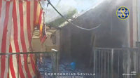 Se salda sin heridos un incendio en la caseta del Distrito Este de la Feria de Sevilla declarado durante el montaje