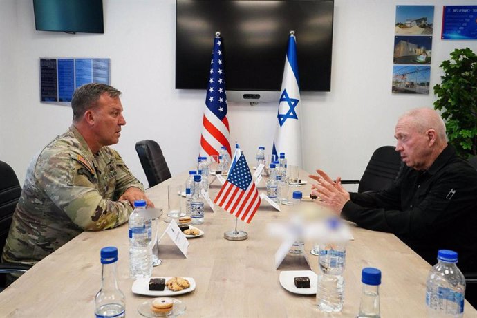 April 12, 2024, Hatzor Airbase, Israel: Israeli Defense Minister YOAV GALLANT (in black) meets with US CENTCOM Commander Gen. MICHAEL ERIK KURILLA at the IAF Hatzor airbase. The two discussed readiness for an Iranian attack against the State of Israel, wh