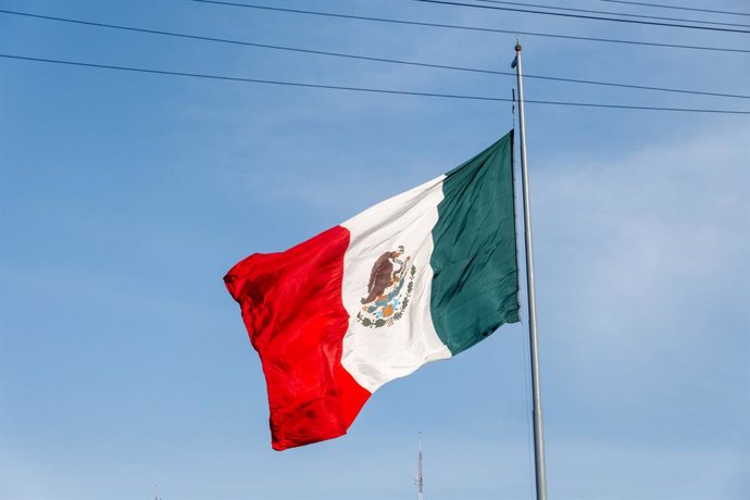 Archivo - March 14, 2024, Mexico City, Cdmx, Mexico: Mexico flag hangs at Zócalo in Mexico City, the historic heart of the capital, a bustling square surrounded by iconic landmarks.