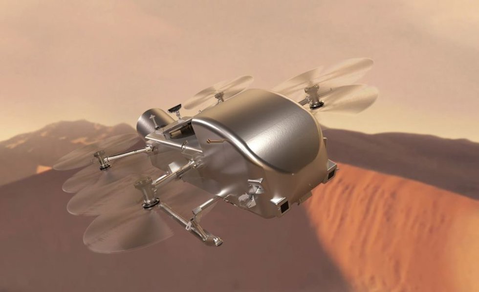 Impresión artística de Dragonfly volando sobre las dunas de Titán, la luna de Saturno.