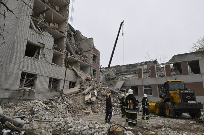 April 17, 2024, Chernihiv, Ukraine: Rescuers are seen at a destroyed building following a missile attack by the Russian army. After a missile blow to Chernihiv, 17 people were killed by the Russian army.