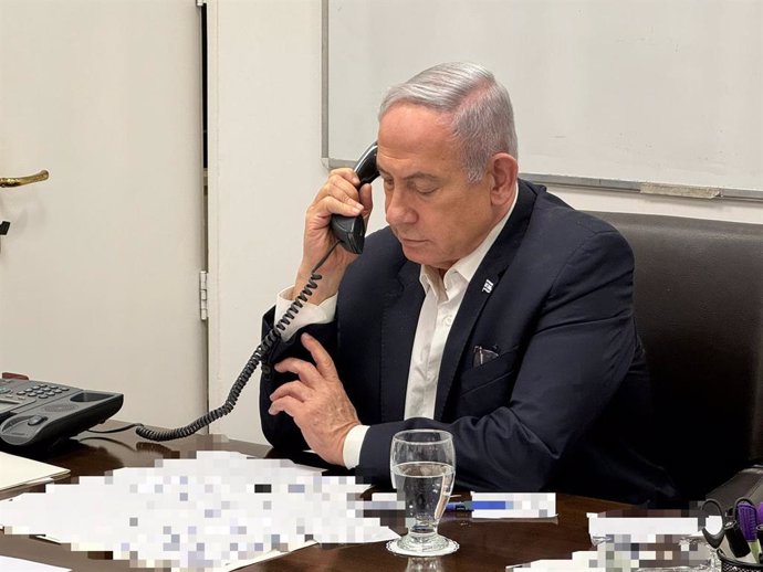 BEIJING, April 15, 2024  -- This photo released on April 14, 2024 shows Israeli Prime Minister Benjamin Netanyahu making a phone call with U.S. President Joe Biden. U.S. President Joe Biden told Israeli Prime Minister Benjamin Netanyahu during a call on S