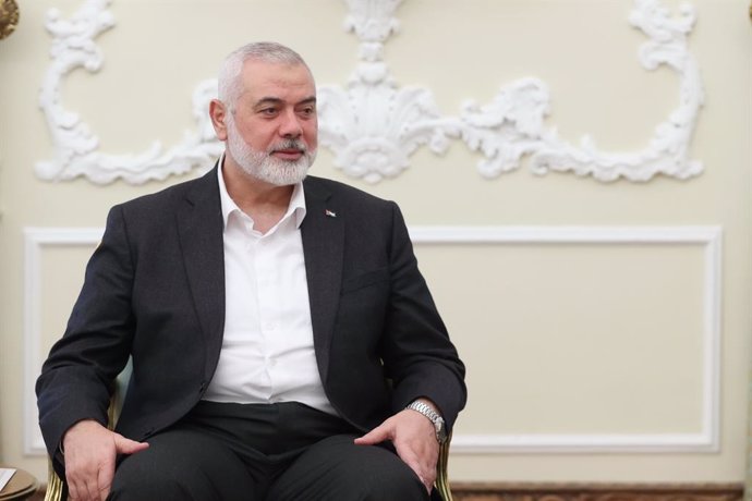 FILED - 27 March 2024, Iran, Tehran: Ismail Haniyeh, chairman of the politburo of the Palestinian Hamas movement, meets with President of Iran Ebrahim Raisi (Not Pictured). Three sons and three grandchildren of the political leader of the Palestinian mili