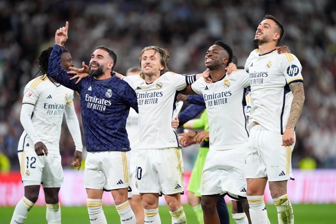 Daniel Carvajal, Luka Modric, Vinicius Junior and Joselu Mato of Real Madrid celebrates the 3-2 victory during the Spanish League, LaLiga EA Sports, football match played between Real Madrid and FC Barcelona at Santiago Bernabeu stadium on April 21, 2024 