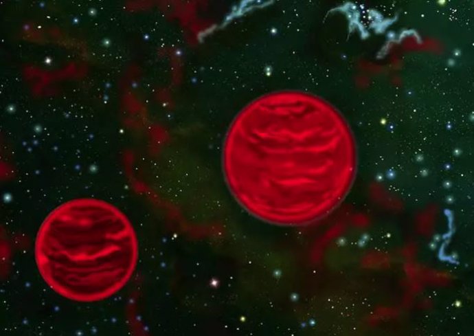 Los objetos binarios con masa de Júpiter que flotan libremente son comunes incluso cuando la teoría estelar y planetaria actual no puede explicar su existencia. Representación artística de uno de estos sistemas, no a escala.